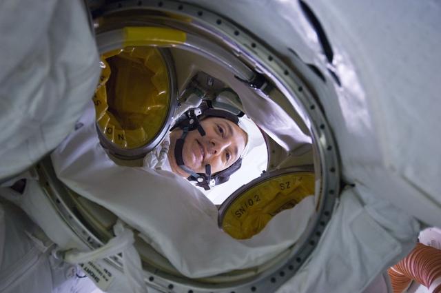 NASA image: STS-125 Crew Member poses for a photo on the Middeck prior to EVA4