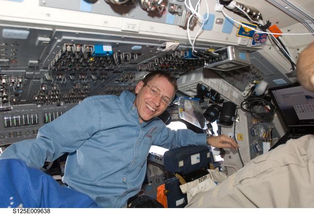 NASA image: STS-125 Pilot Gregory Johnson on the Flight Deck during Flight Day 8