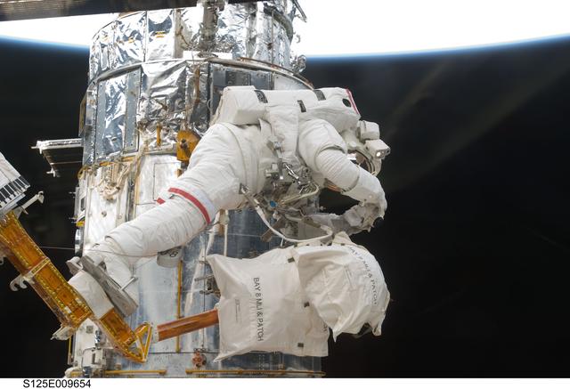NASA image: STS-125 MS3 Grunsfeld during EVA5