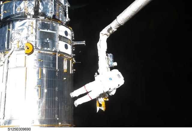 NASA image: STS-125 MS3 Grunsfeld during EVA5