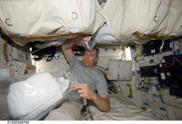 NASA image: View of STS-125 MS5 Feustel on the Shuttle Atlantis Middeck