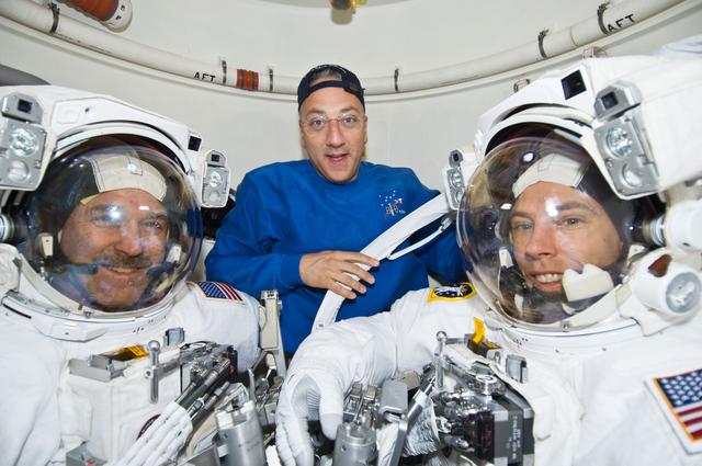 NASA image: STS-125 Crew Members pose for a photo prior to EVA5