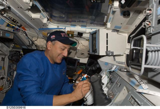 NASA image: STS-125 MS4 Massimino works on the Flight Deck during Flight Day 8