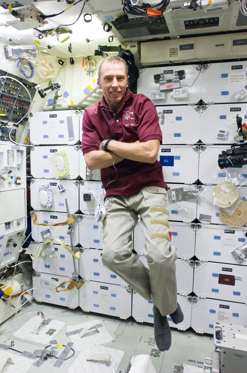 S125-E-012329 (19 May 2009) --- Astronaut Andrew Feustel, STS-125 mission specialist, is pictured on the middeck of the Earth-orbiting Space Shuttle Atlantis during flight day nine activities.
