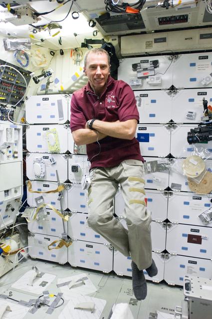 NASA image: MS5 Andrew Feustel poses for a photo in the Middeck