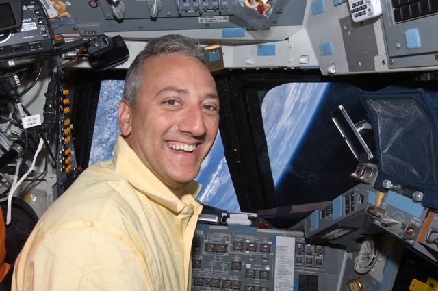 NASA image: STS-125 MS Mike Massimino poses for a photo on the Flight Deck