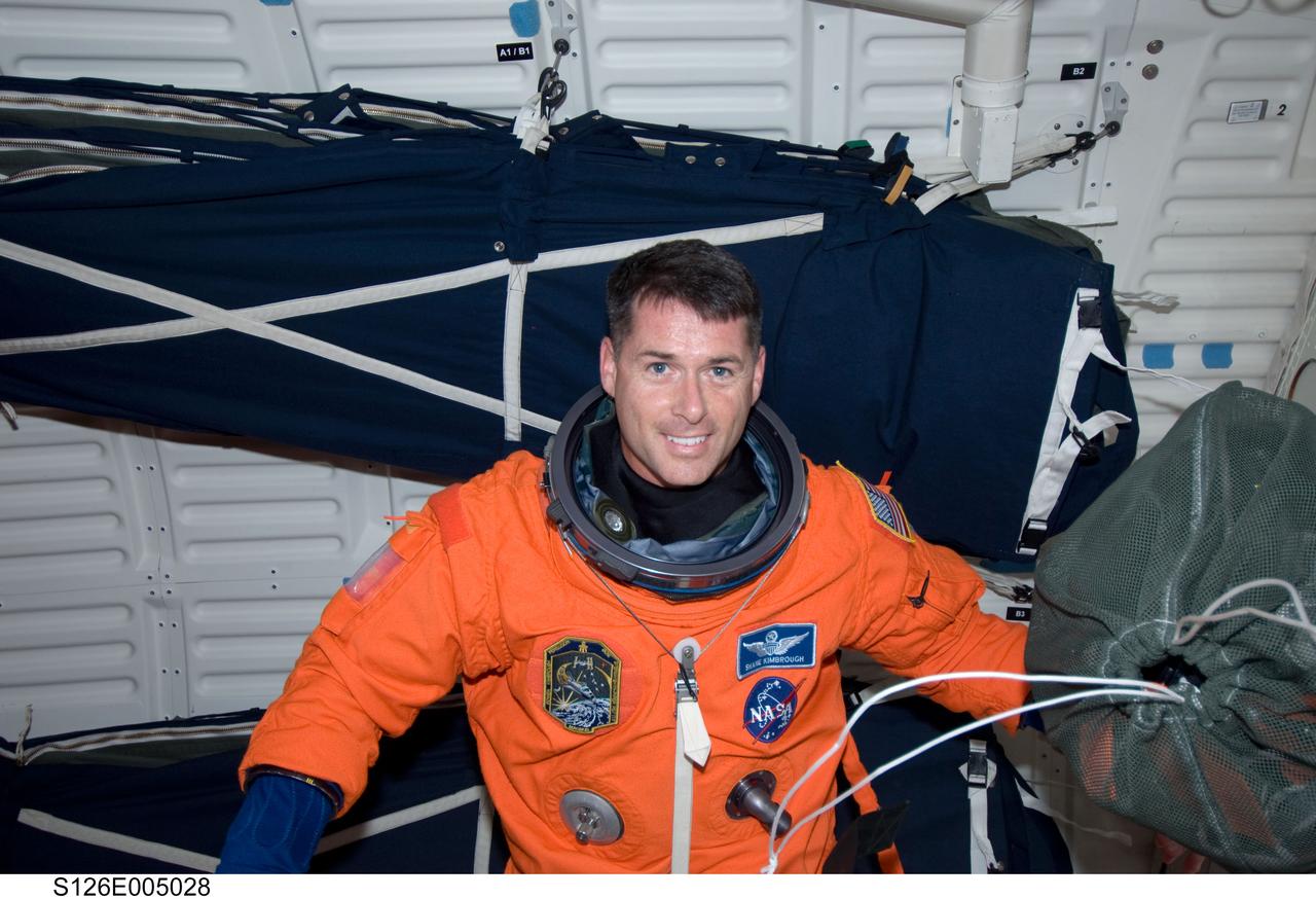 S126-E-005028 (14 Nov. 2008) --- Astronaut Shane Kimbrough, STS-126 mission specialist, attired in his shuttle launch and entry suit, is pictured on the middeck of Space Shuttle Endeavour during post launch activities.