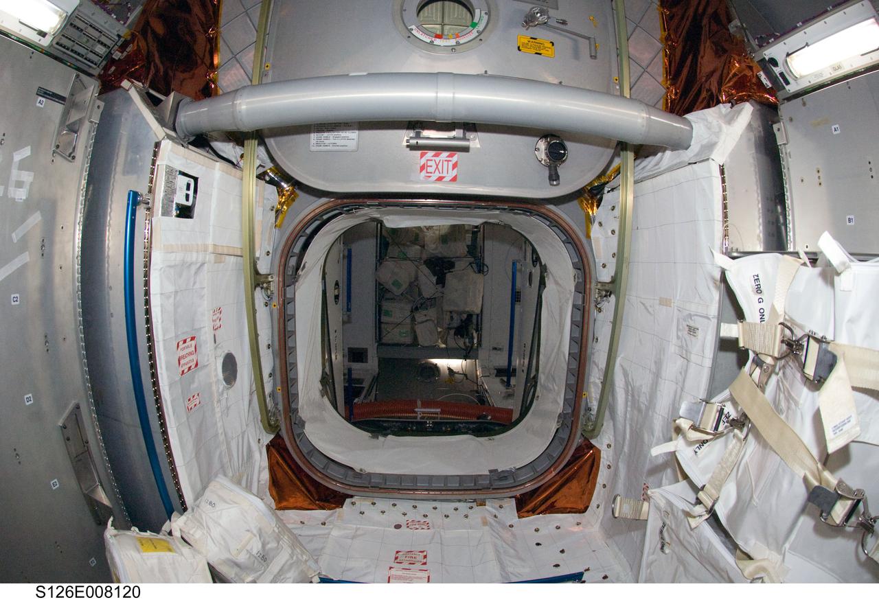 S126-E-008120 (18 Nov. 2008) --- Interior view of the Leonardo Multi-Purpose Logistics Module attached to the Earth-facing port of the International Space Station's Harmony node. Leonardo was moved from Space Shuttle Endeavour's cargo bay and linked to the station on Nov. 17, carrying two water recovery systems racks for recycling urine into potable water, a second toilet system, new gallery components, two new food warmers, a food refrigerator, an experiment freezer, combustion science experiment rack, two separate sleeping quarters and a resistance exercise device (aRED) that allows station crewmembers to perform a variety of exercises.