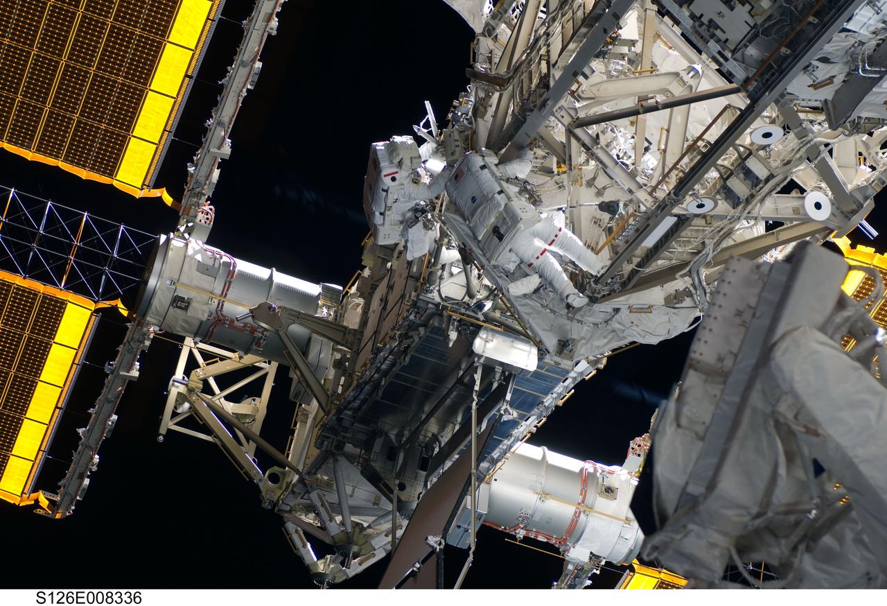 S126-E-008336 (20 Nov. 2008) --- Astronauts Heidemarie Stefanyshyn-Piper (left) and Shane Kimbrough, both STS-126 mission specialists, participate in the mission's second scheduled session of extravehicular activity (EVA) as construction and maintenance continue on the International Space Station. During the six-hour, 45-minute spacewalk, Piper and Kimbrough continued the process of removing debris and applying lubrication around the starboard Solar Alpha Rotary Joint (SARJ), replaced four more of the SARJ's 12 trundle bearing assemblies, relocated two equipment carts and applied lubrication to the station's robotic Canadarm2.