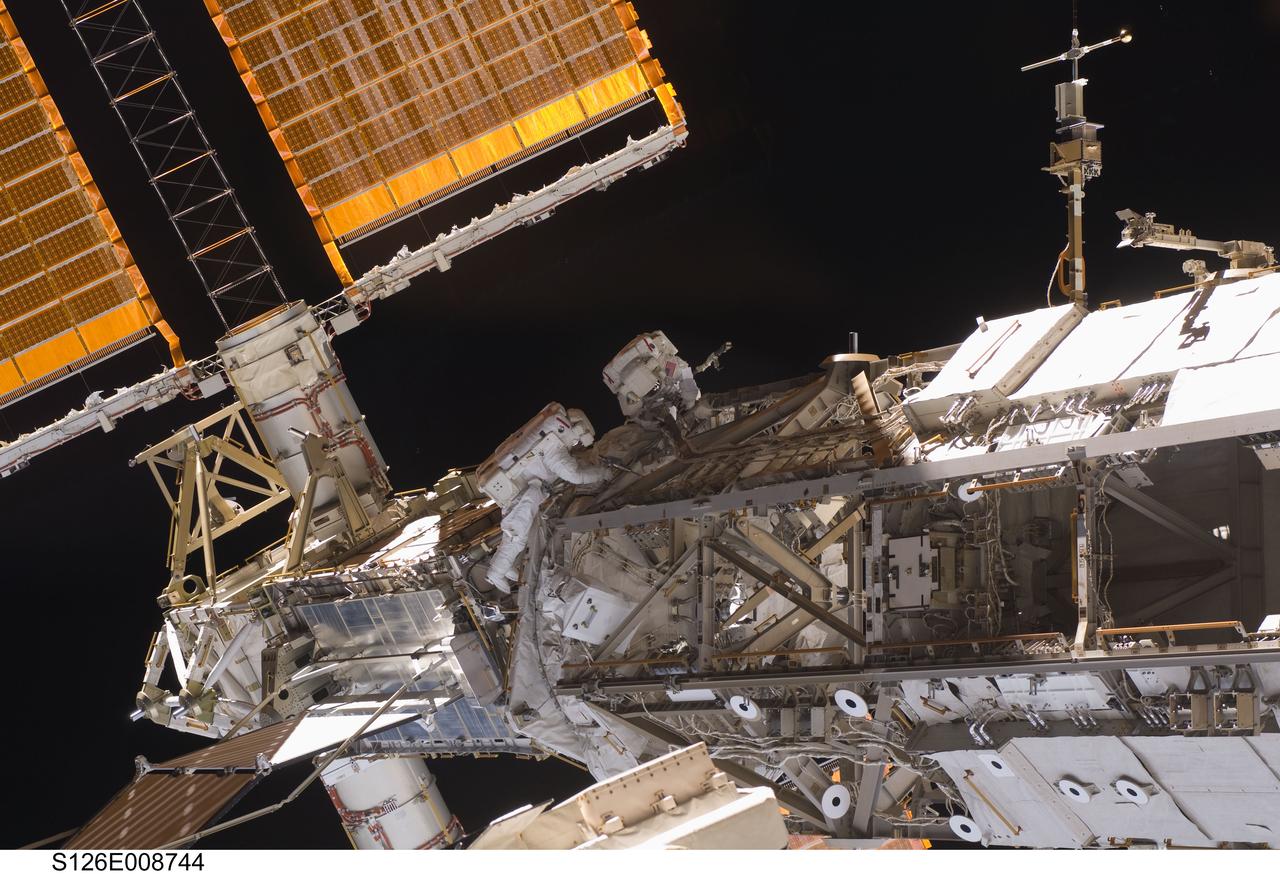 S126-E-008744 (20 Nov. 2008) --- Astronauts Heidemarie Stefanyshyn-Piper (left) and Shane Kimbrough, both STS-126 mission specialists, participate in the mission's second scheduled session of extravehicular activity (EVA) as construction and maintenance continue on the International Space Station. During the six-hour, 45-minute spacewalk, Piper and Kimbrough continued the process of removing debris and applying lubrication around the starboard Solar Alpha Rotary Joint (SARJ), replaced four more of the SARJ's 12 trundle bearing assemblies, relocated two equipment carts and applied lubrication to the station's robotic Canadarm2.