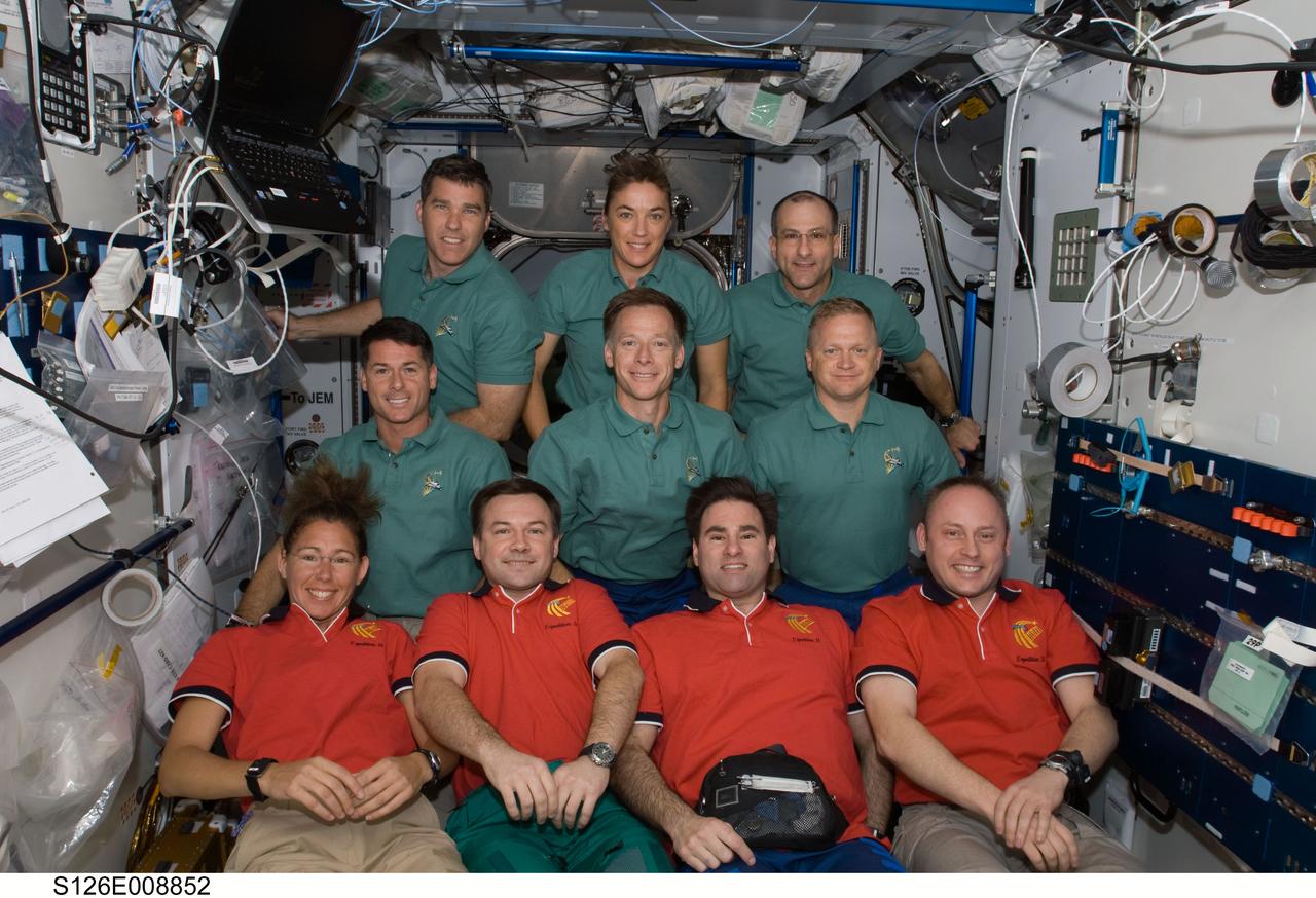 S126-E-008852 (21 Nov. 2008) --- Following a space-to-Earth press conference, members of the International Space Station and Space Shuttle Endeavour crews posed for a group portrait on the orbital outpost. From left, bottom row, are astronaut Sandra Magnus, cosmonaut Yury Lonchakov, and astronauts Gregory Chamitoff and Michael Fincke.  From left, middle row, are astronauts Shane Kimbrough, Chris Ferguson and Eric Boe.  From left, top row, are astronauts Steve Bowen, Heidemarie Stefanyshyn-Piper and Donald Pettit.
