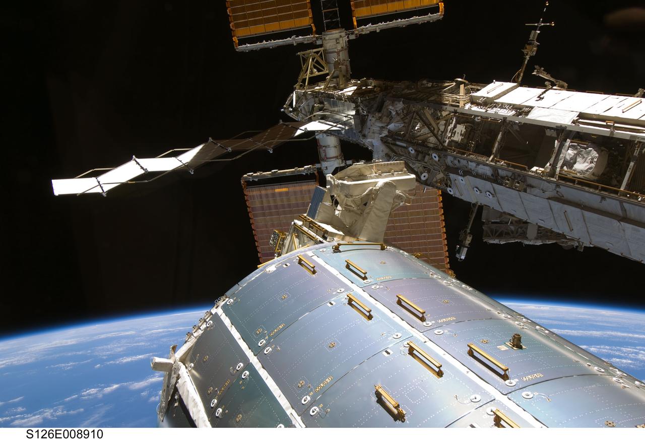 S126-E-008910 (22 Nov. 2008) --- Astronaut Steve Bowen, STS-126 mission specialist, participates in the mission's third scheduled session of extravehicular activity (EVA) as construction and maintenance continue on the International Space Station. During the six-hour, 57-minute spacewalk, Bowen and astronaut Heidemarie Stefanyshyn-Piper (out of frame), mission specialist, focused their efforts on the continued cleaning of the station's starboard solar alpha rotary joint (SARJ) and the removal and replacement of trundle bearing assemblies (TBA). Bowen and Piper also cleaned the area around the SARJ's drive lock assemblies, which help the joint to rotate and lock into place.