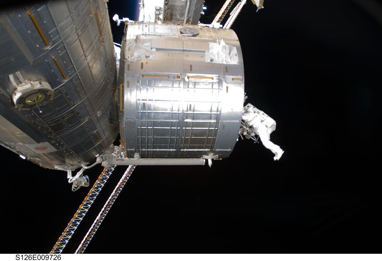 S126-E-009726 (24 Nov. 2008) --- Astronaut Steve Bowen, STS-126 mission specialist, participates in the mission's fourth and final scheduled session of extravehicular activity (EVA) as construction and maintenance continue on the International Space Station. During the six-hour, seven-minute spacewalk, Bowen and astronaut Shane Kimbrough (out of frame), mission specialist, completed the lubrication of the port Solar Alpha Rotary Joints (SARJ) as well as other station assembly tasks. Bowen returned to the starboard SARJ to install the final trundle bearing assembly, retracted a berthing mechanism latch on the Japanese Kibo Laboratory and reinstalled its thermal cover. Bowen also installed a video camera on the Port 1 truss and attached a Global Positioning System antenna on the Japanese Experiment Module Pressurized Section.