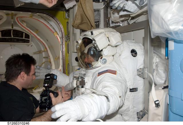 NASA image: Chamitoff and Bowen in A/L following EVA 4
