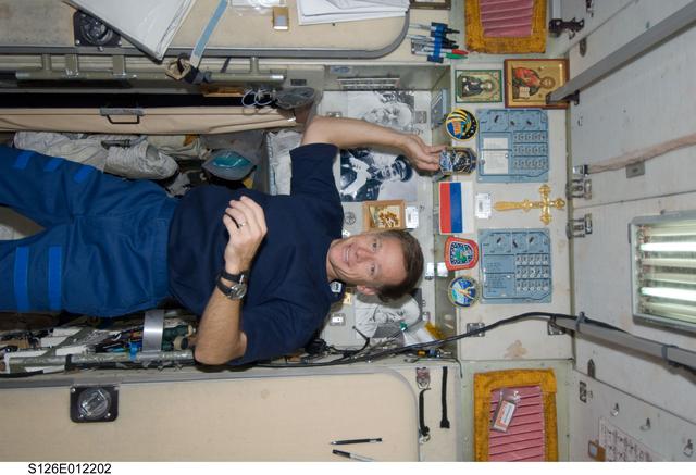 NASA image: Ferguson places Mission Patch in SM