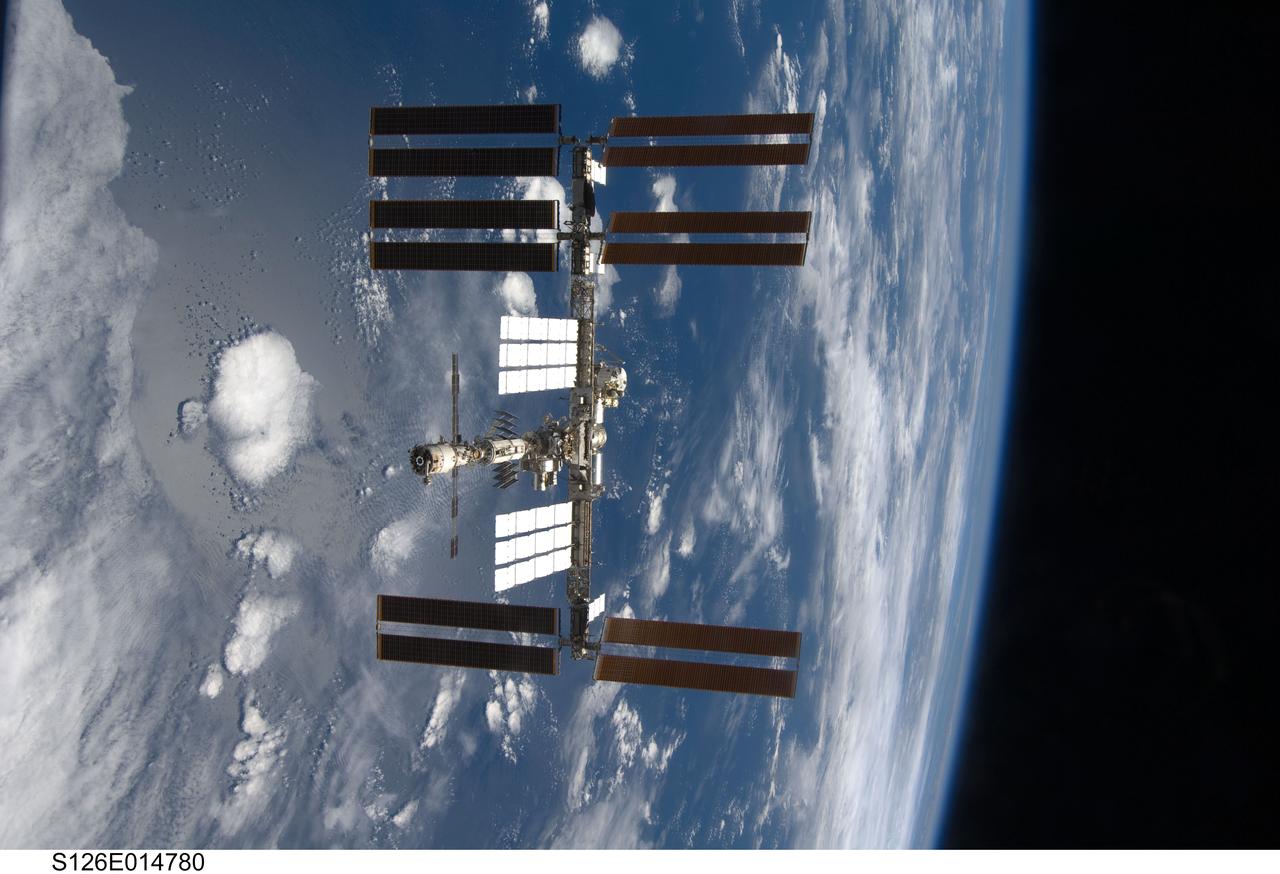 S126-E-014780 (28 Nov. 2008) --- Backdropped by a blue and white Earth and the blackness of space, the International Space Station is seen from Space Shuttle Endeavour as the two spacecraft begin their relative separation. Earlier the STS-126 and Expedition 18 crews concluded 11 days, 16 hours and 46 minutes of cooperative work onboard the shuttle and station. Undocking of the two spacecraft occurred at 8:47 a.m. (CST) on Nov. 28, 2008.