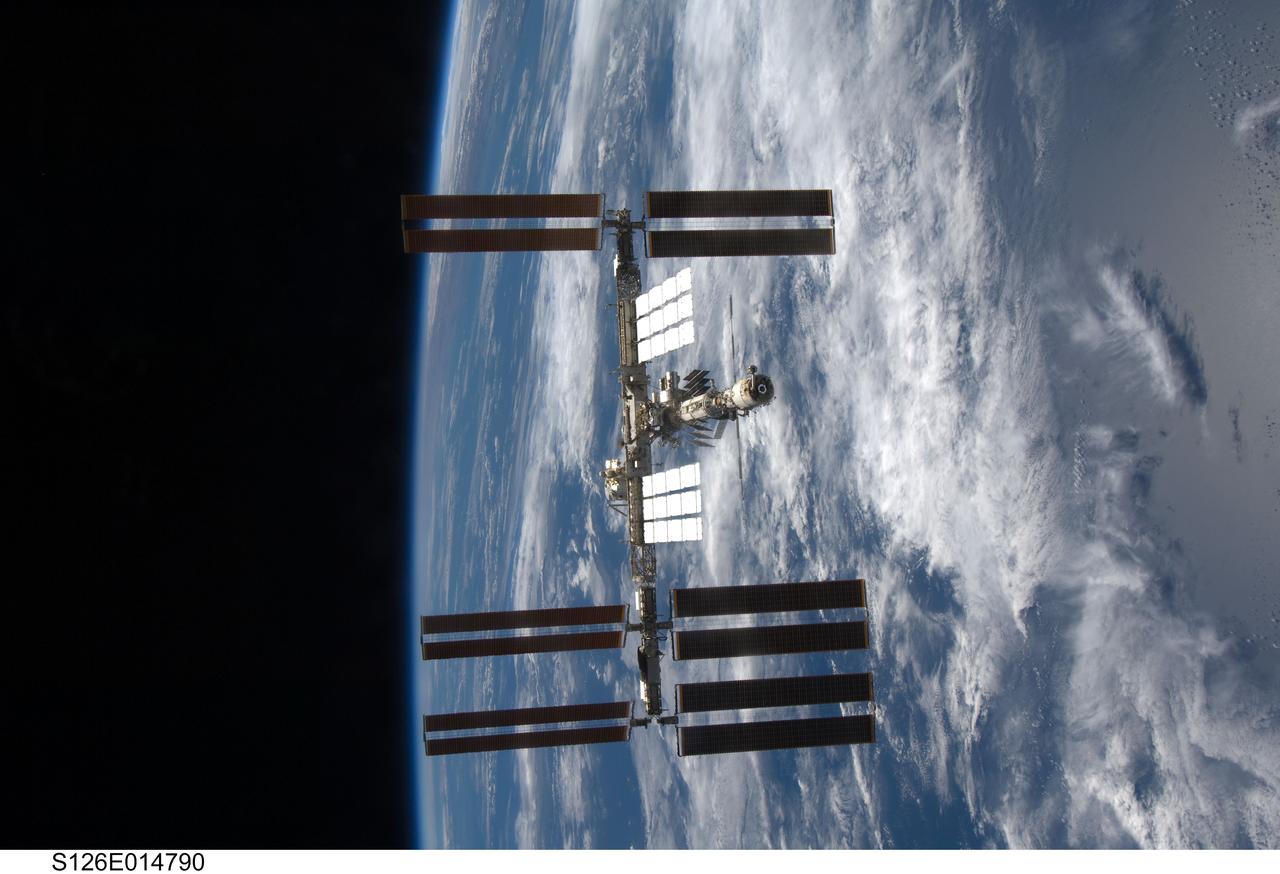 S126-E-014790 (28 Nov. 2008) --- Backdropped by a blue and white Earth and the blackness of space, the International Space Station is seen from Space Shuttle Endeavour as the two spacecraft begin their relative separation. Earlier the STS-126 and Expedition 18 crews concluded 11 days, 16 hours and 46 minutes of cooperative work onboard the shuttle and station. Undocking of the two spacecraft occurred at 8:47 a.m. (CST) on Nov. 28, 2008.