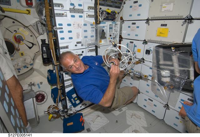 NASA image: Wolf installs GIRA in the MDDK of Space Shuttle Endeavour during the STS-127 Mission