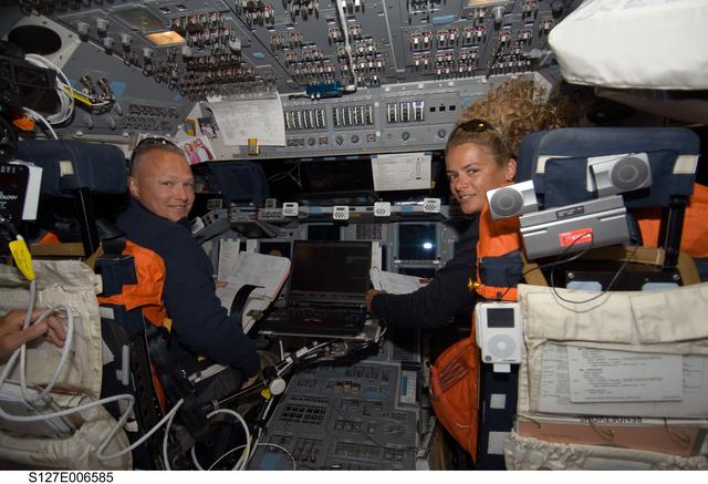 NASA image: Hurley and Payette in the FWD FD during docking activities of Space Shuttle Endeavour