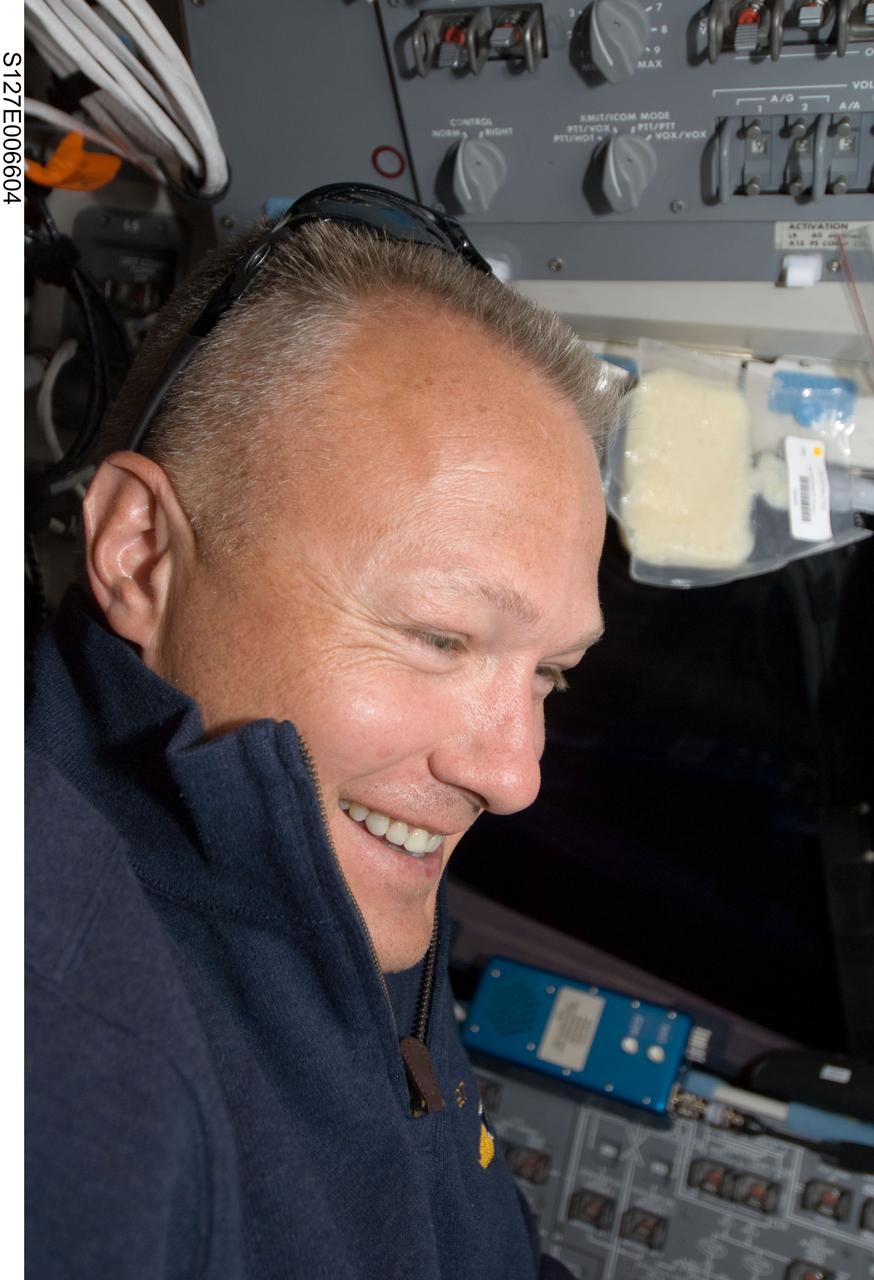 S127-E-006604 (17 July 2009) --- Astronaut Doug Hurley, STS-127 pilot, on Endeavour's flight deck during flight day 3.