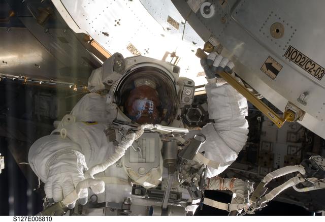 Kopra in Endeavours Payload Cargo Bay during EVA-1 on STS-127 / Expedition 20 Joint Operations