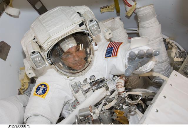 NASA image: Wolf in the A/L during STS-127 / Expedition 20 Joint Operations