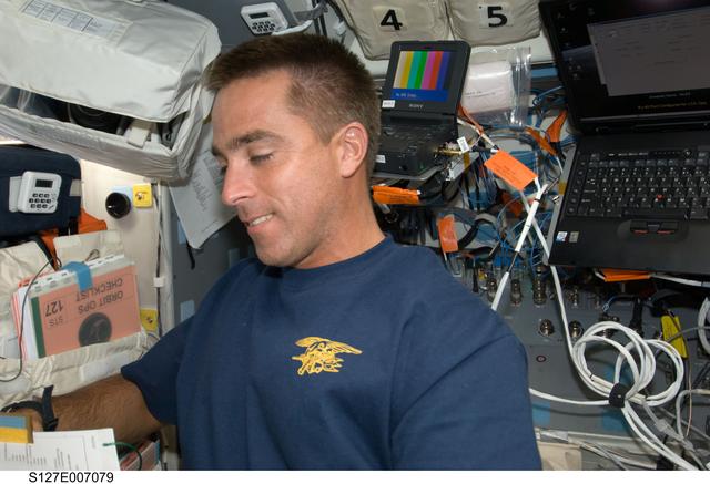 NASA image: Cassidy looks at Crew Procedures in the Aft FD during Joint Operations