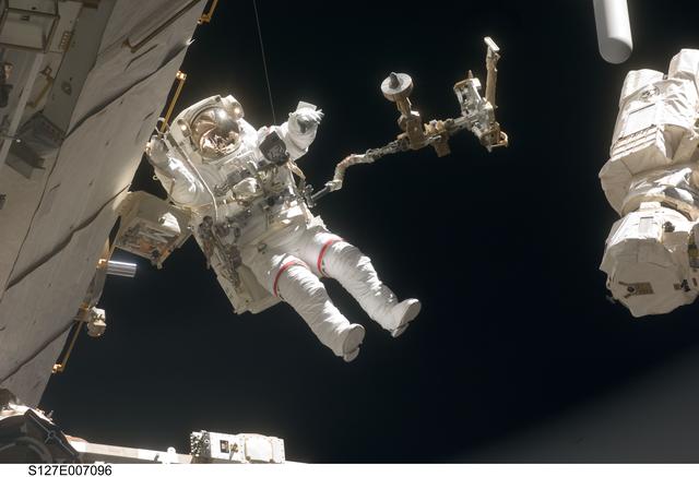 NASA image: Wolf during EVA-2 on STS-127 / Expedition 20 Joint Operations