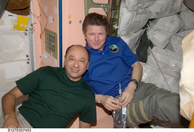 NASA image: Polansky and Padalka in the Node 1 during Joint Operations