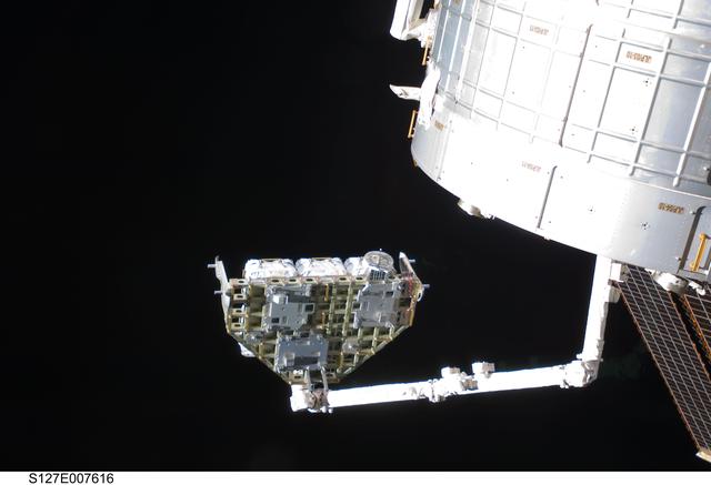NASA image: SSRMS moves ICC-VLD during Joint operations.