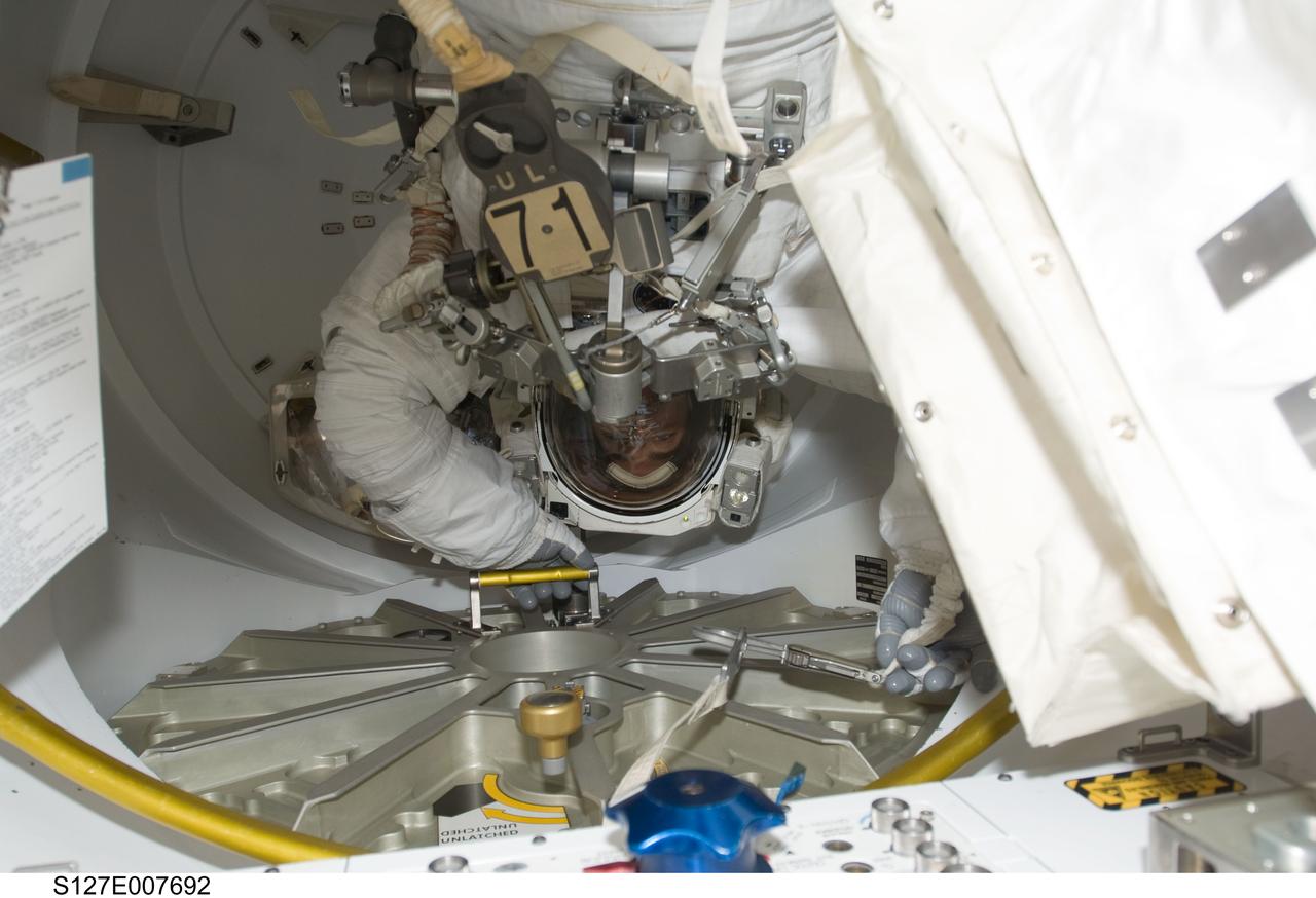 S127-E-007692 (22 July 2009) --- Astronaut Christopher Cassidy, STS-127 mission specialist, prepares to participate in Endeavour's third space walk of a scheduled five overall for this flight.