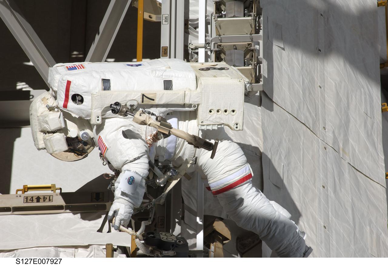 S127-e-007927 (22 July 2009) --- Astronaut Dave Wolf, mission specialist, is pictured during his third and final STS-127 session of extravehicular activity. The crew has two more spacewalks scheduled after this to continue work on the International Space Station.