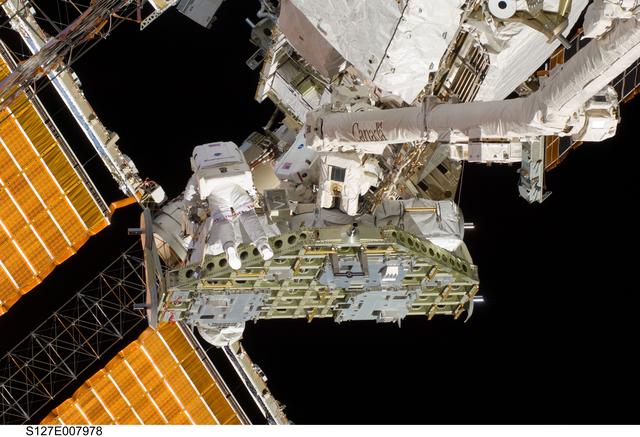 NASA image: Wolf and Cassidy works with the ICC during EVA-3