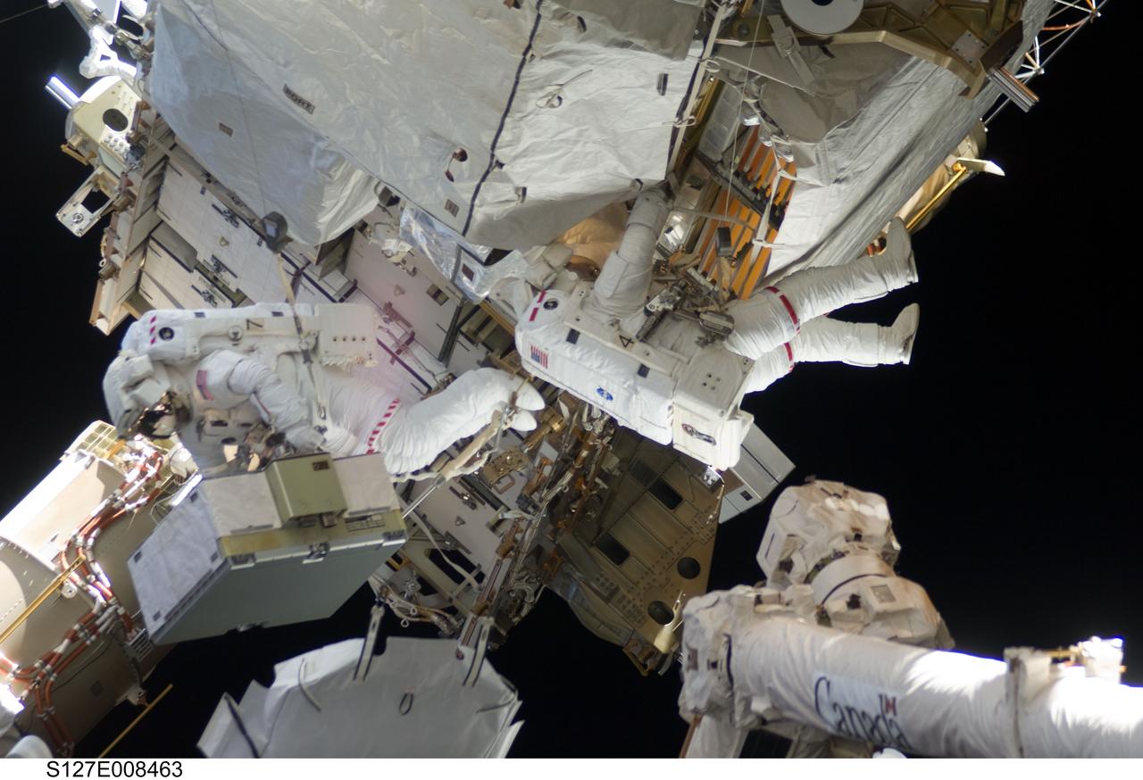S127-E-008463 (24 July 2009) --- Astronauts Tom Marshburn (right) and Christopher Cassidy, mission specialists for STS-127, share duties on the fourth spacewalk of Endeavour's current mission and its crew's joint activities with the space station. Eleven astronauts and cosmonauts remained inside the International Space Station and the shuttle to which it was docked, while the two continued work on the orbital outpost. The two will team up for the mission's final spacewalk on July 27.