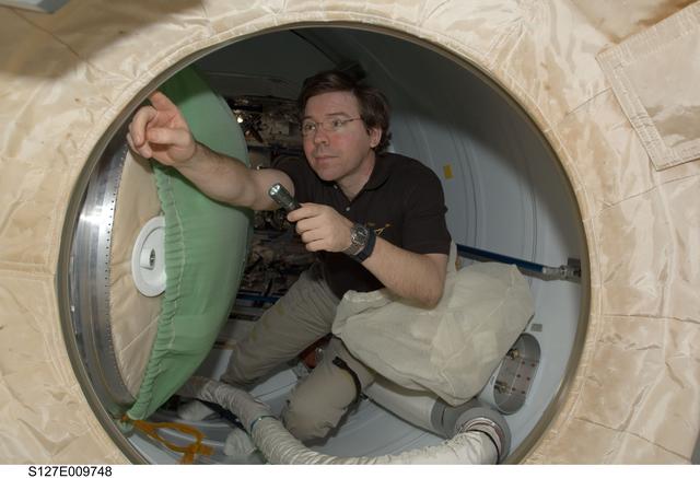 NASA image: Barratt in the PMA-2 during Joint Operations