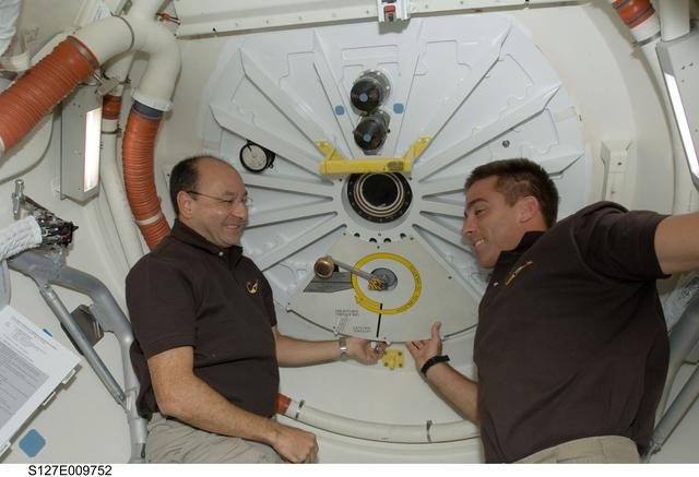 NASA image: Polansky and Cassidy in the A/L of Endeavour