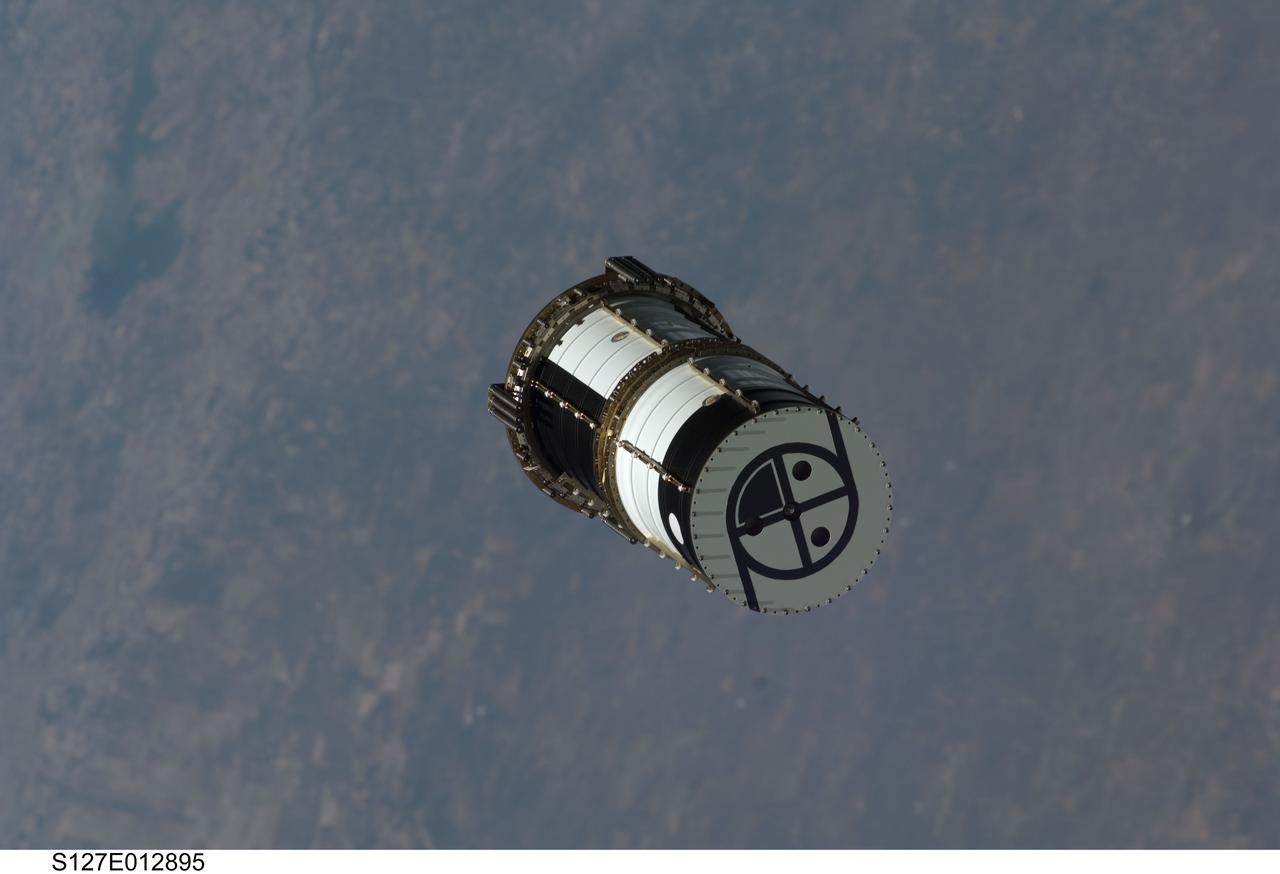 S127-E-012895 (30 July 2009) --- A Department of Defense pico-satellite known as Atmospheric Neutral Density Experiment 2 (ANDE-2) is photographed after its release from Space Shuttle Endeavour's payload bay by STS-127 crew members. ANDE-2 consists of two spherical micro-satellites which will measure the density and composition of the low-Earth orbit (LEO) atmosphere while being tracked from the ground. The data will be used to better predict the movement of objects in orbit.