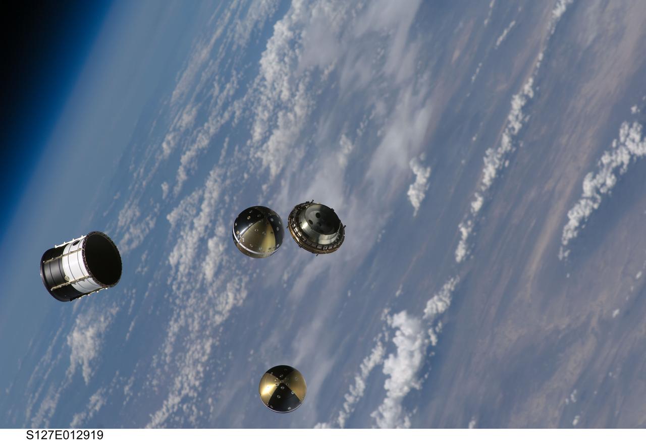 S127-E-012919 (30 July 2009) --- Backdropped by a blue and white Earth, a Department of Defense pico-satellite known as Atmospheric Neutral Density Experiment 2 (ANDE-2) is photographed after its release from Space Shuttle Endeavour's payload bay by STS-127 crew members. ANDE-2 consists of two spherical micro-satellites which will measure the density and composition of the low-Earth orbit (LEO) atmosphere while being tracked from the ground. The data will be used to better predict the movement of objects in orbit.