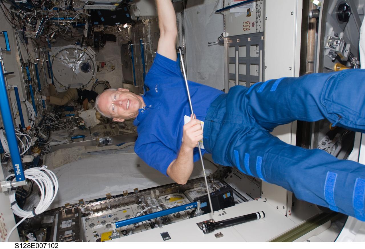 S128-E-007102 (31 Aug. 2009) --- Astronaut Patrick Forrester, STS-128 mission specialist, is pictured in the Kibo laboratory of the International Space Station while Space Shuttle Discovery remains docked to the station.