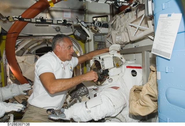 NASA image: Extravehicular Mobility Unit (EMU) Prep in Joint Airlock
