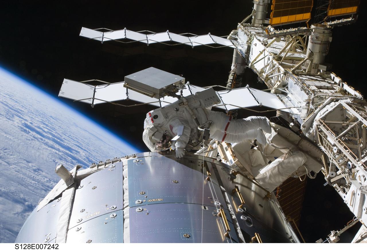S128-E-007242 (1 Sept. 2009) --- Astronaut Nicole Stott, Expedition 20 flight engineer, participates in the STS-128 mission's first session of extravehicular activity (EVA) as construction and maintenance continue on the International Space Station. During the six-hour, 35-minute spacewalk, Stott and astronaut John “Danny” Olivas (out of frame), mission specialist, removed an empty ammonia tank from the station’s truss and temporarily stowed it on the station’s robotic arm. Olivas and Stott also retrieved the European Technology Exposure Facility (EuTEF) and Materials International Space Station Experiment (MISSE) from the Columbus laboratory module and installed them on Discovery’s payload bay for return.