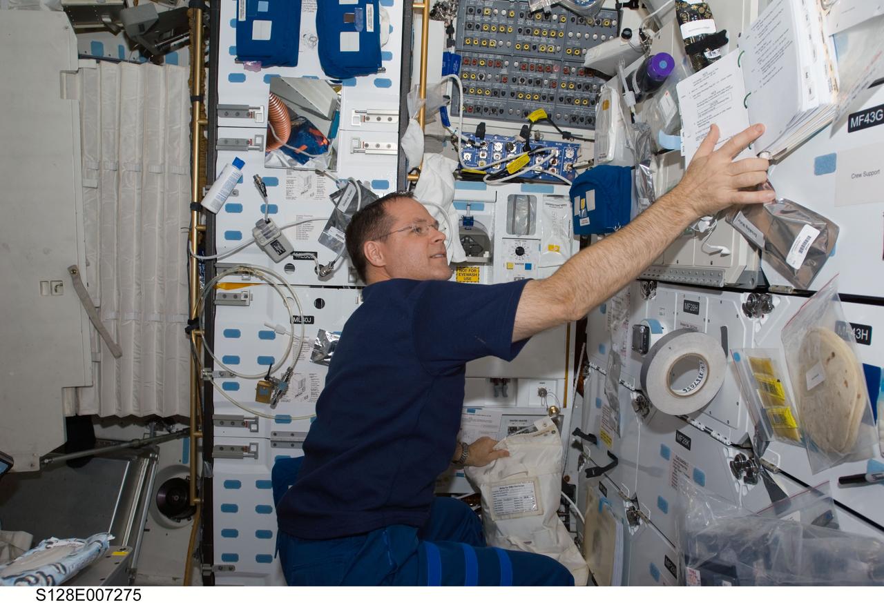 S128-E-007275 (4 Sept. 2009) --- As the STS-128 crew and the Space Shuttle Discovery are about half way through their mission, the countenance of astronaut Kevin Ford, pilot, seen here on the middeck, shows his pleasure with the way things are going. At this point, from inside the shuttle and station, Ford and his crewmates have supported two of three spacewalks, with the final one scheduled for Sept. 5. Aside from the spacewalks, a long list of tasks has been performed by the aggregation of 13 astronauts and cosmonauts sharing space on the two spacecraft for several days.