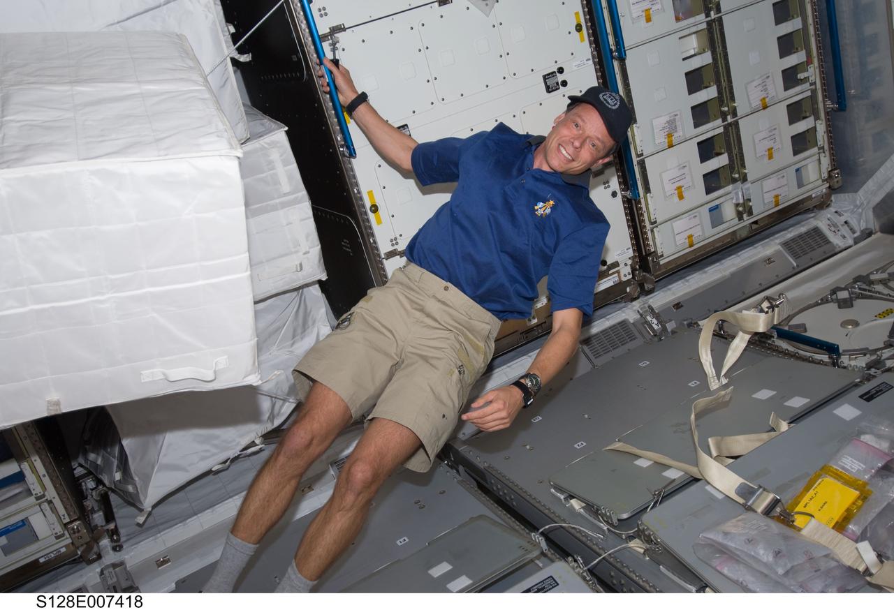 S128-E-007418 (1 Sept. 2009) --- European Space Agency astronaut Christer Fuglesang, STS-128 mission specialist, is pictured in the Leonardo Multi-Purpose Logistics Module (MPLM), temporarily attached to the International Space Station while Space Shuttle Discovery remains docked with the station.