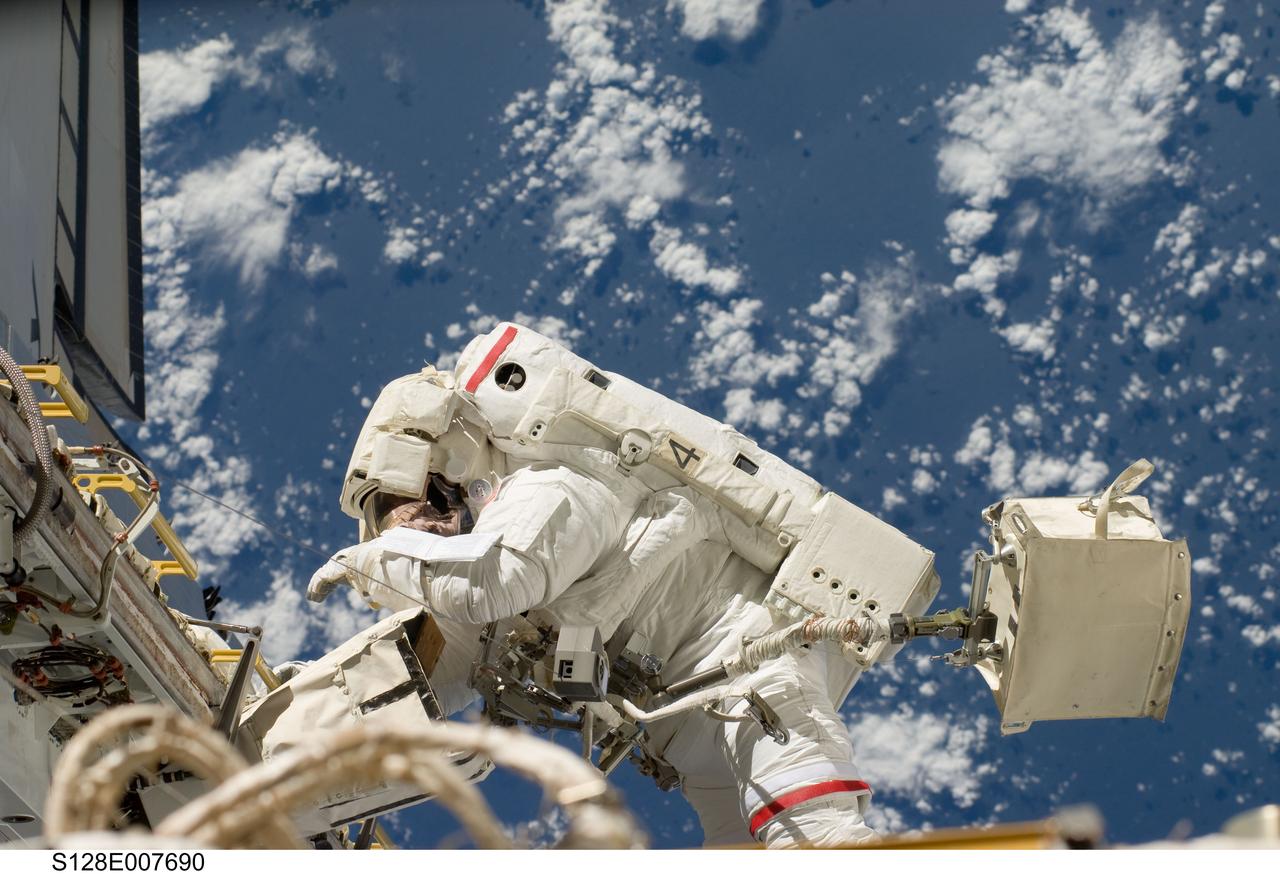 S128-E-007690 (3 Sept. 2009) --- NASA astronaut John “Danny” Olivas, STS-128 mission specialist, participates in the mission's second session of extravehicular activity (EVA) as construction and maintenance continue on the International Space Station. During the six-hour, 39-minute spacewalk, Olivas and European Space Agency astronaut Christer Fuglesang (out of frame), mission specialist, installed the new Ammonia Tank Assembly on the Port 1 Truss and stowed the empty tank assembly into the Space Shuttle Discovery’s cargo bay.