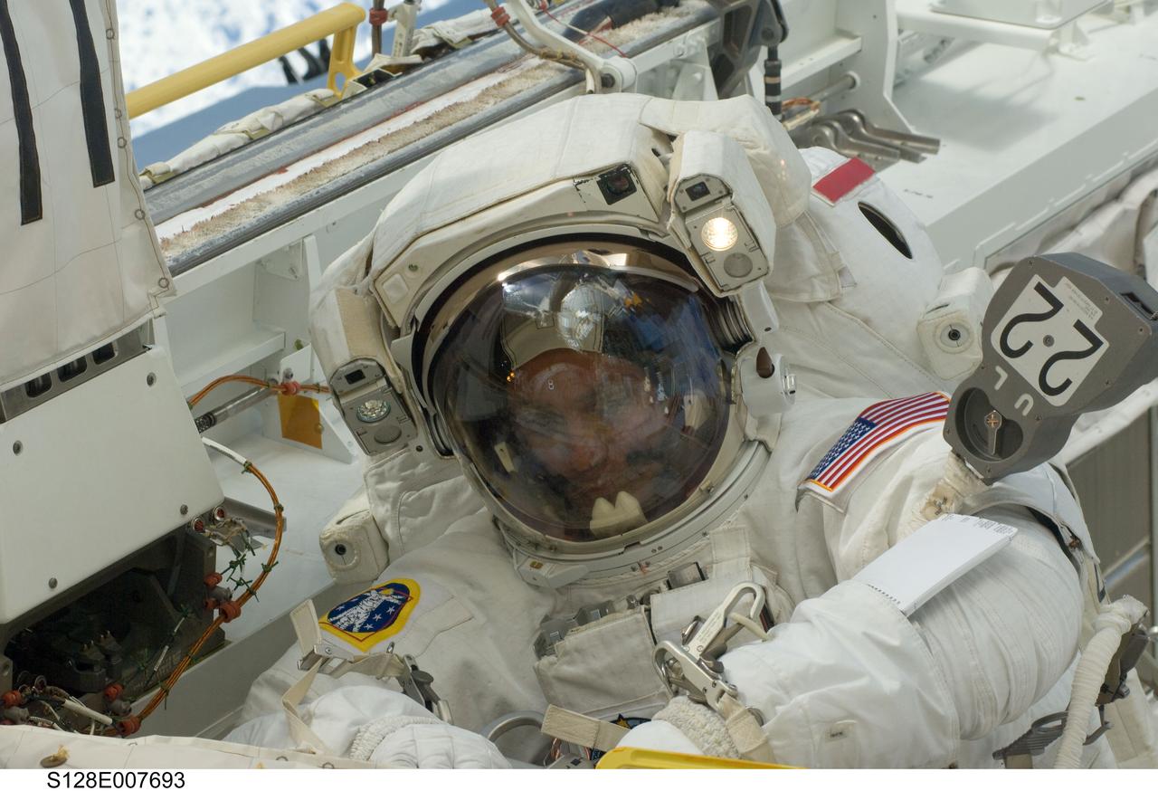 S128-E-007693 (3 Sept. 2009) --- NASA astronaut John “Danny” Olivas, STS-128 mission specialist, participates in the mission's second session of extravehicular activity (EVA) as construction and maintenance continue on the International Space Station. During the six-hour, 39-minute spacewalk, Olivas and European Space Agency astronaut Christer Fuglesang (out of frame), mission specialist, installed the new Ammonia Tank Assembly on the Port 1 Truss and stowed the empty tank assembly into the Space Shuttle Discovery’s cargo bay.