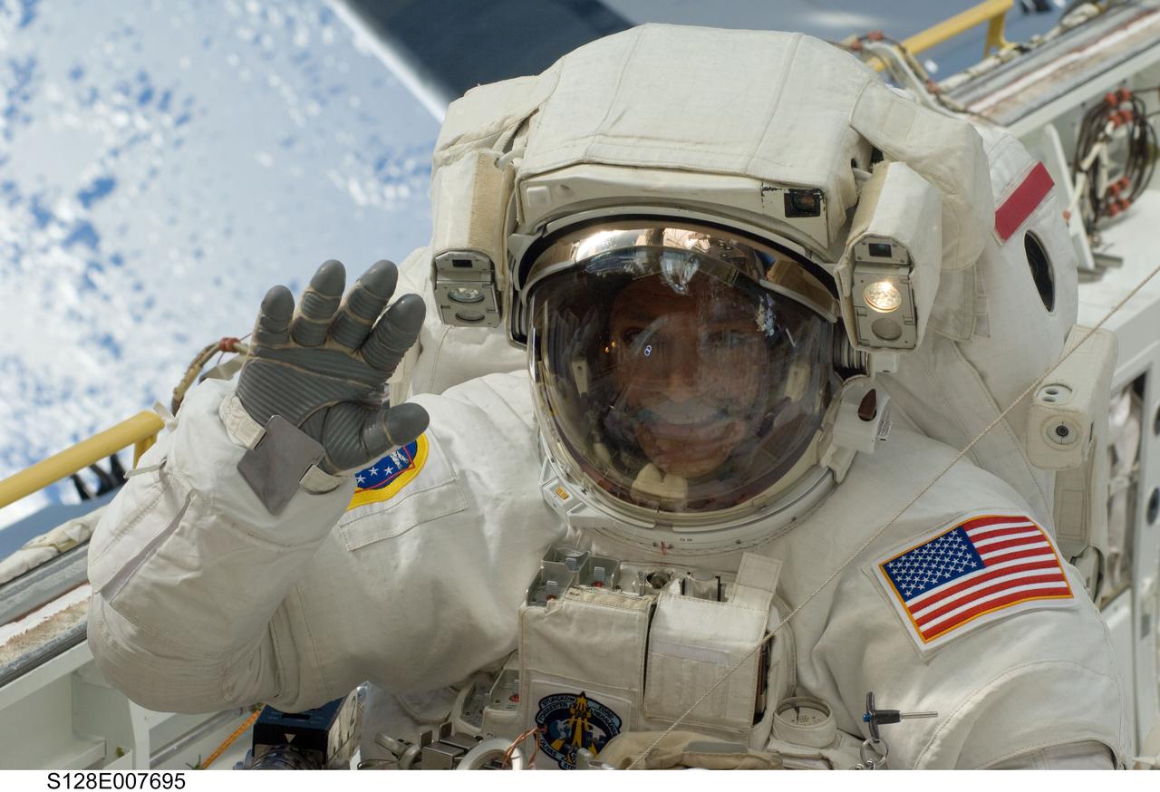S128-E-007695 (3 Sept. 2009) --- NASA astronaut John “Danny” Olivas, STS-128 mission specialist, participates in the mission's second session of extravehicular activity (EVA) as construction and maintenance continue on the International Space Station. During the six-hour, 39-minute spacewalk, Olivas and European Space Agency astronaut Christer Fuglesang (out of frame), mission specialist, installed the new Ammonia Tank Assembly on the Port 1 Truss and stowed the empty tank assembly into the Space Shuttle Discovery’s cargo bay.