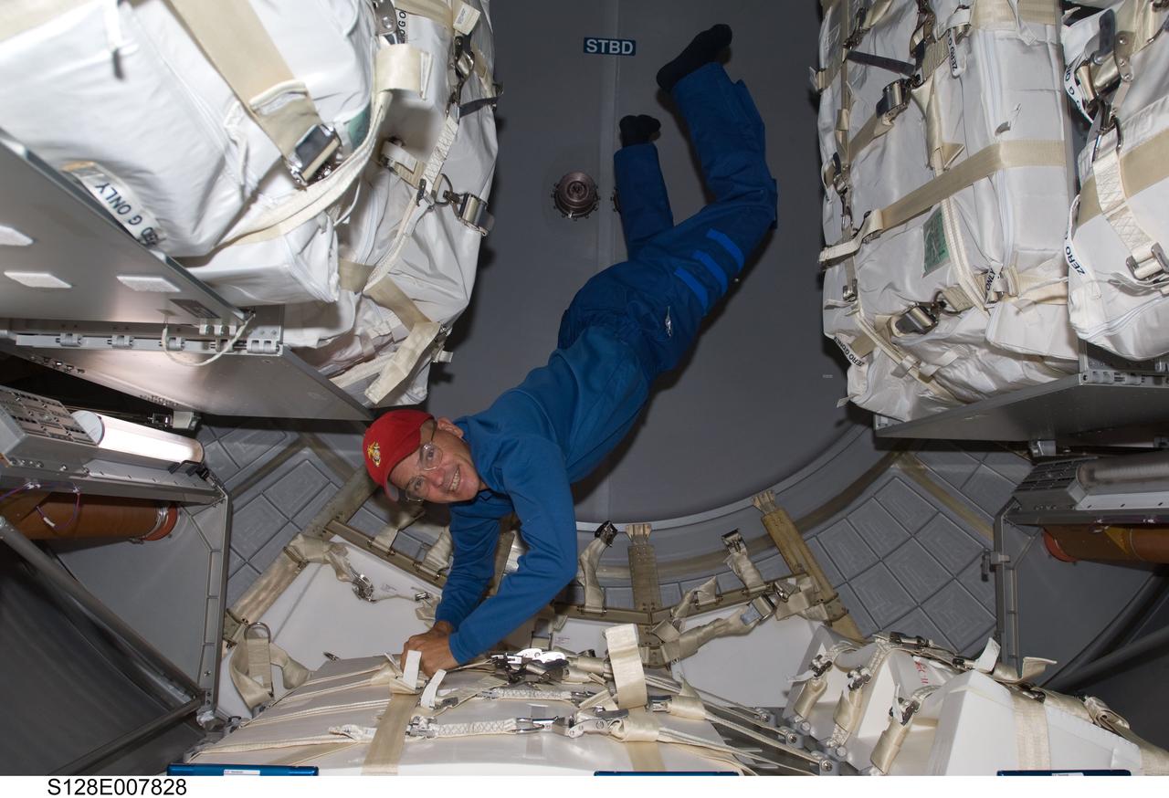 S128-E-007828 (6 Sept. 2009) --- NASA astronaut Rick Sturckow, STS-128 commander, works in the Leonardo Multi-Purpose Logistics Module (MPLM), temporarily attached to the International Space Station while Space Shuttle Discovery remains docked with the station.