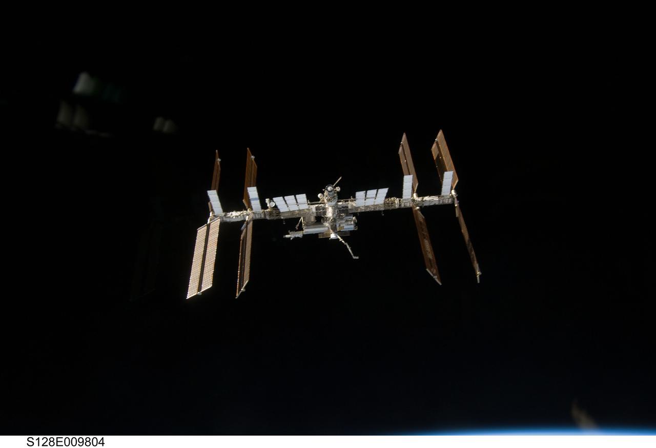 S128-E-009804 (8 Sept. 2009) --- Backdropped by the blackness of space, the International Space Station is seen from Space Shuttle Discovery as the two spacecraft begin their relative separation. Earlier the STS-128 and Expedition 20 crew concluded nine days of cooperative work onboard the shuttle and station. Undocking of the two spacecraft occurred at 2:26 p.m. (CDT) on Sept. 8, 2009.