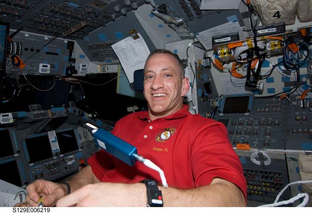 NASA image: STS-129 CDR Hobaugh poses for a photo on the FD