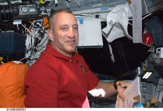 NASA image: STS-129 CDR Hobaugh poses for a photo on the FD